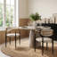 Ensemble de 2 chaises de salle à manger modernes Elara, avec accoudoirs et revêtement en boucle beige.