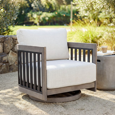 Fauteuil club pivotant avec coussins Sereno