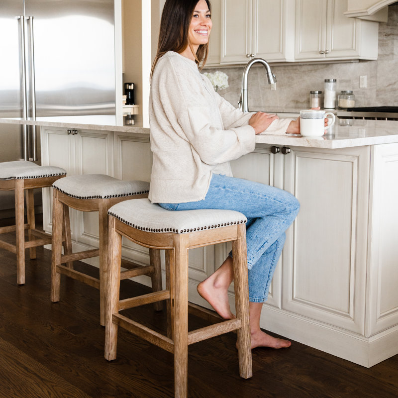 Maven Lane Adrien Backless Saddle Kitchen Stool with Fabric Upholstery, Sand Fabric / Weathered Oak