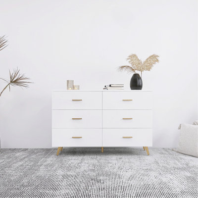 Commode 6 tiroirs avec poignée dorée et pieds en acier doré