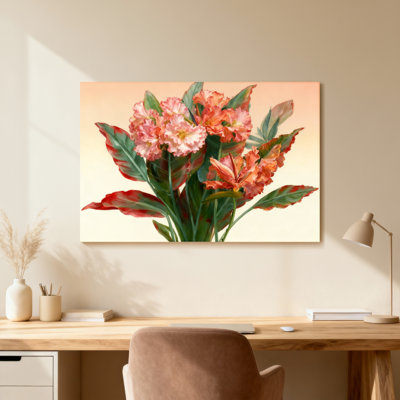 Arrangement floral de plantes et de fleurs avec des fleurs roses et oranges