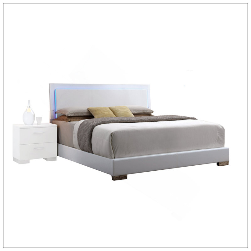 Grand lit blanc avec tête de lit à DEL pour un confort accru et une esthétique moderne