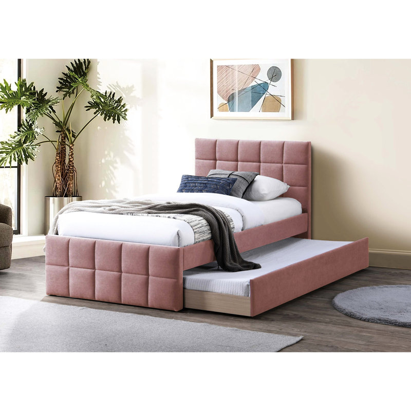 Lit double pleine grandeur avec lit gigogne et tête de lit tapissier à motif quadrillé pour une chambre à coucher contemporaine