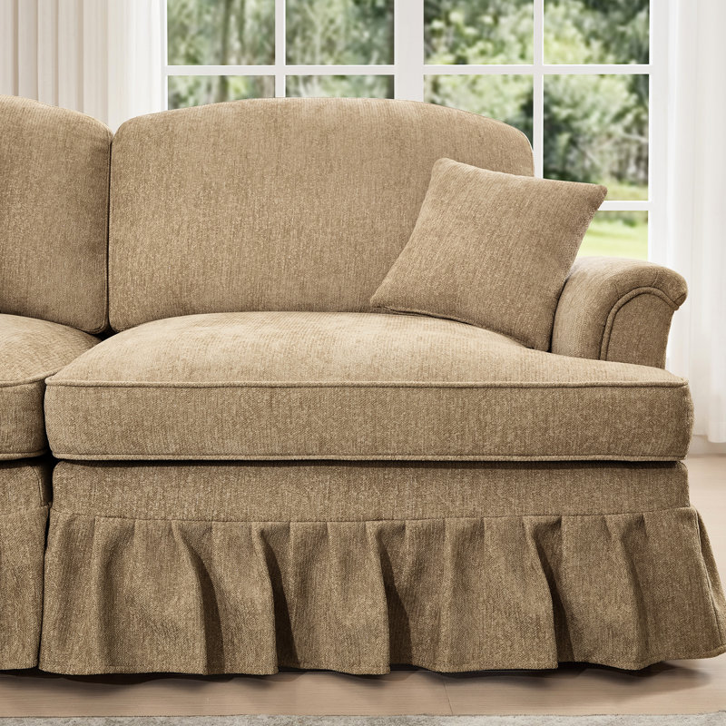 3 places confortables et modulaires en chenille de café, avec accoudoirs évasés, jupes plissées à volants amovibles et repose-pieds amovibles pour des environnements décontractés