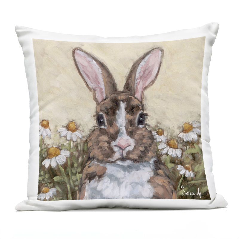 Coussin d'extérieur imprimé lapin avec des marguerites