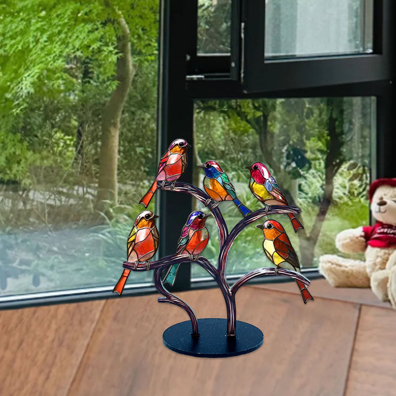 Figurine d'oiseau en acrylique sur une branche