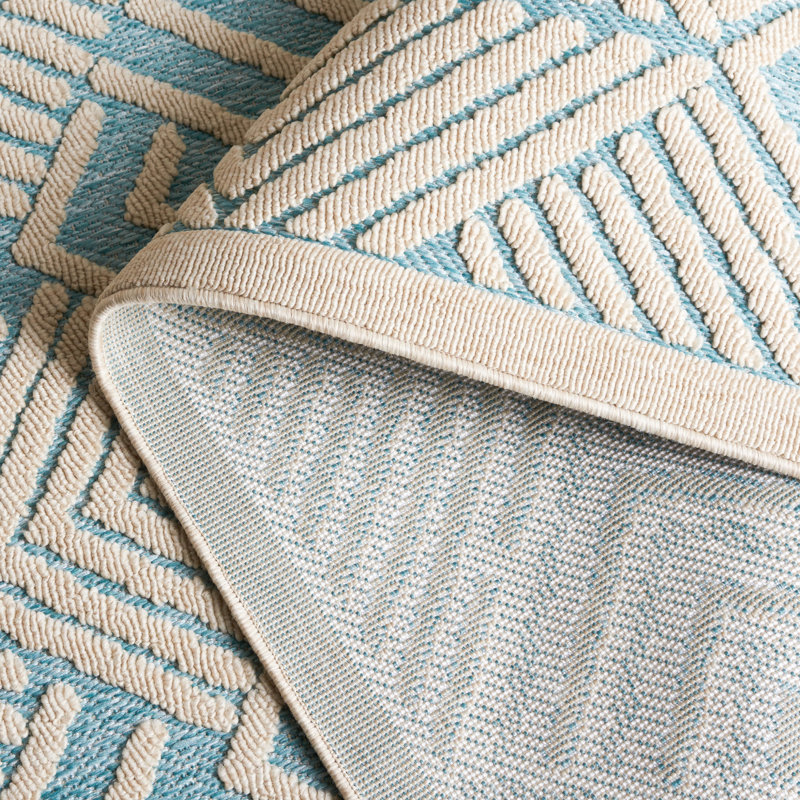 Ivory and Turquoise Geometric 5' x 7' Wool Area Rug