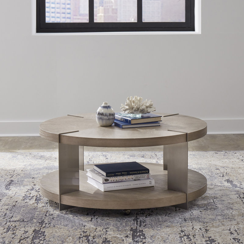 Table basse ronde Euzelia avec pieds et roulettes en métal