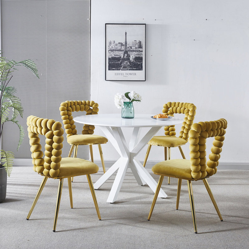 Chaises de salle à manger modernes avec pieds en tube de fer / coussins moelleux / et dossier confortable pour la salle à manger / salon / et café