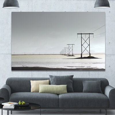 " Electricity Pylons Over Lagoon "