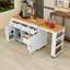Îlot de cuisine avec table de salle à manger extensible, tablettes ouvertes, 3 tiroirs et prise de courant-344877103