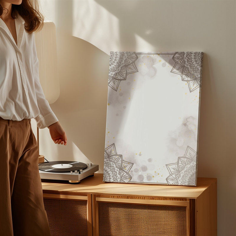 La toile crée un fond serein et élégant avec des motifs d'art délicats complexes de mandala dans des tons beiges doux