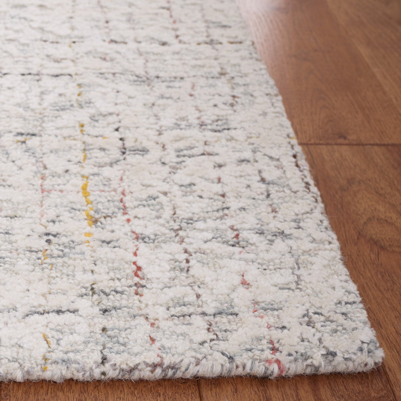 Meira Hand Tufted Area Rug in Ivory, Rectangle 5' x 8'