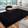 Tapis noir en polyester tissé à la machine Gaimo