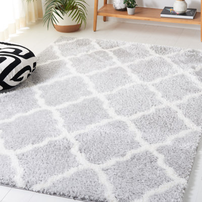 Tapis géométrique gris clair / blanc