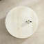Table basse en faux travertin avec motif en relief accrocheur, travertin