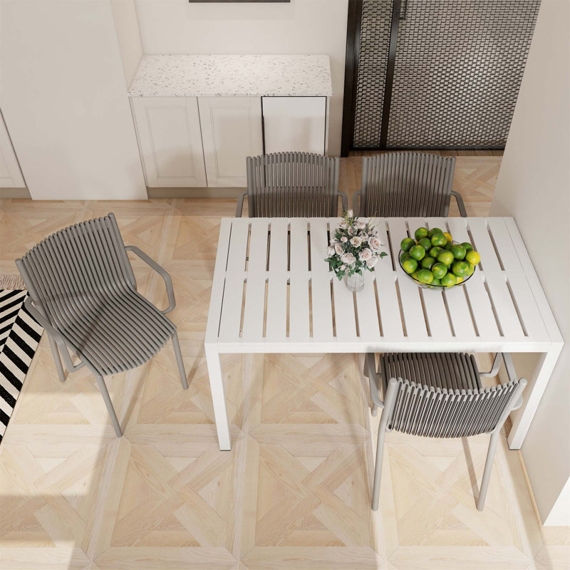 4 fauteuils empilables en PP gris chaud et une table blanche de 55 pouces - structure, patins antidérapants, idéaux pour différents environnements 4 pièces de long, espaces intérieurs / extérieurs sans entretien