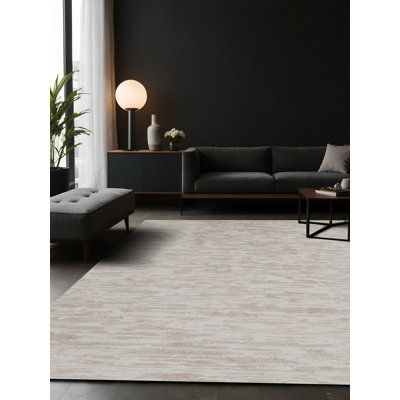 Tapis gris soyeux et moelleux