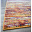 Tapis doré à motif abstrait Alvey-29915531
