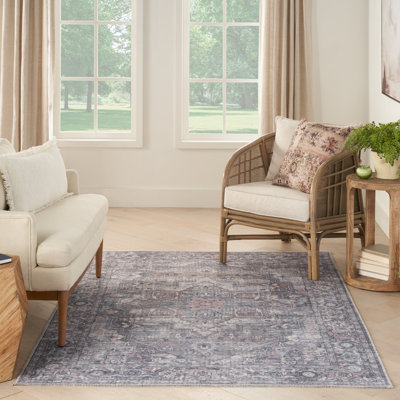 Lyiah Oriental Machine Woven Polyester Area Rug in Grey