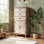 Armoire de rangement en bois rustique avec porte découpée et tiroirs Unavela