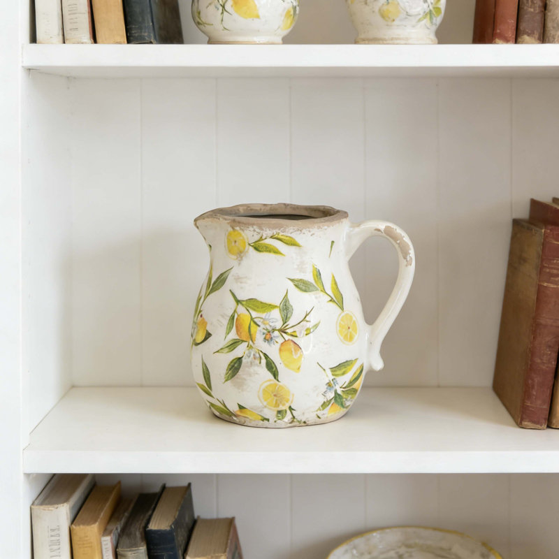 Vase en céramique blanc avec motif jaune citron