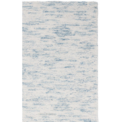 Tapis abstrait touffeté à la main en laine / coton touffeté à la main en ivoire / bleu clair Touete