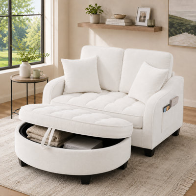 Canapé-lit double contemporain avec repose-pieds incurvé avec accoudoirs irréguliers incurvés et deux coussins décoratifs pour le salon de la chambre à coucher