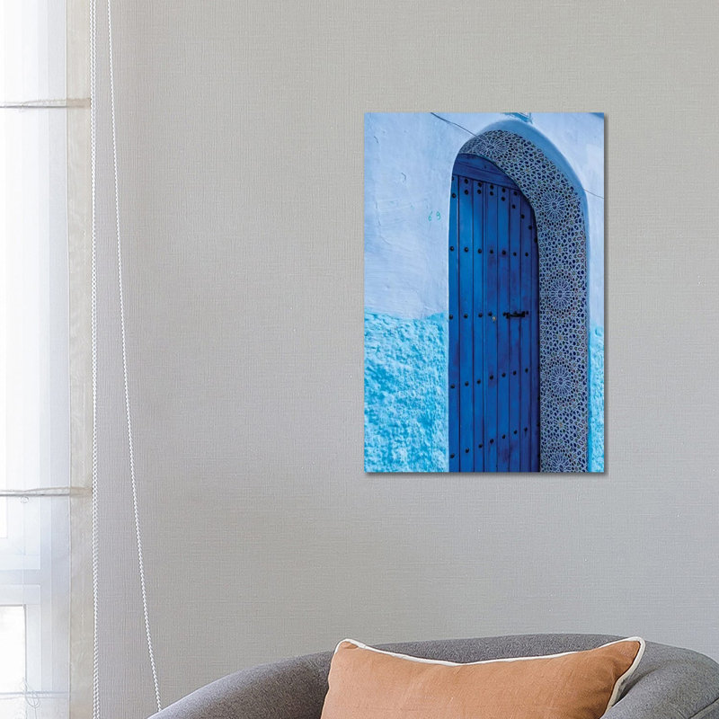 Africa, Morocco, Chefchaouen. Arch Over Wooden Door. by Jaynes Gallery - Wrapped Canvas Print