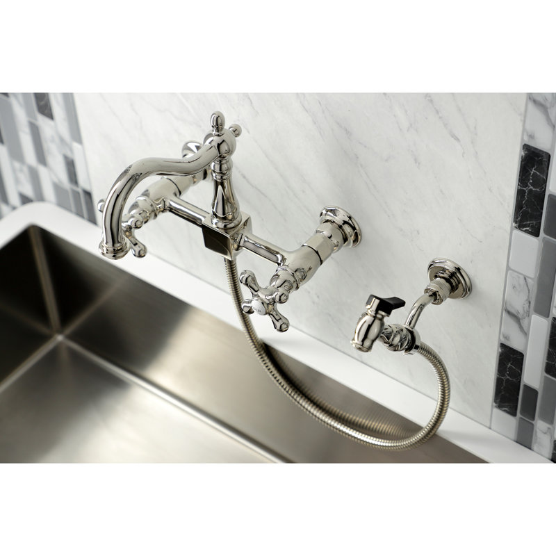 Kingston Brass Heritage Double-Handle 3-Hole Wall-Mount Bridge Kitchen Faucet with Brass Sprayer, Polished Nickel