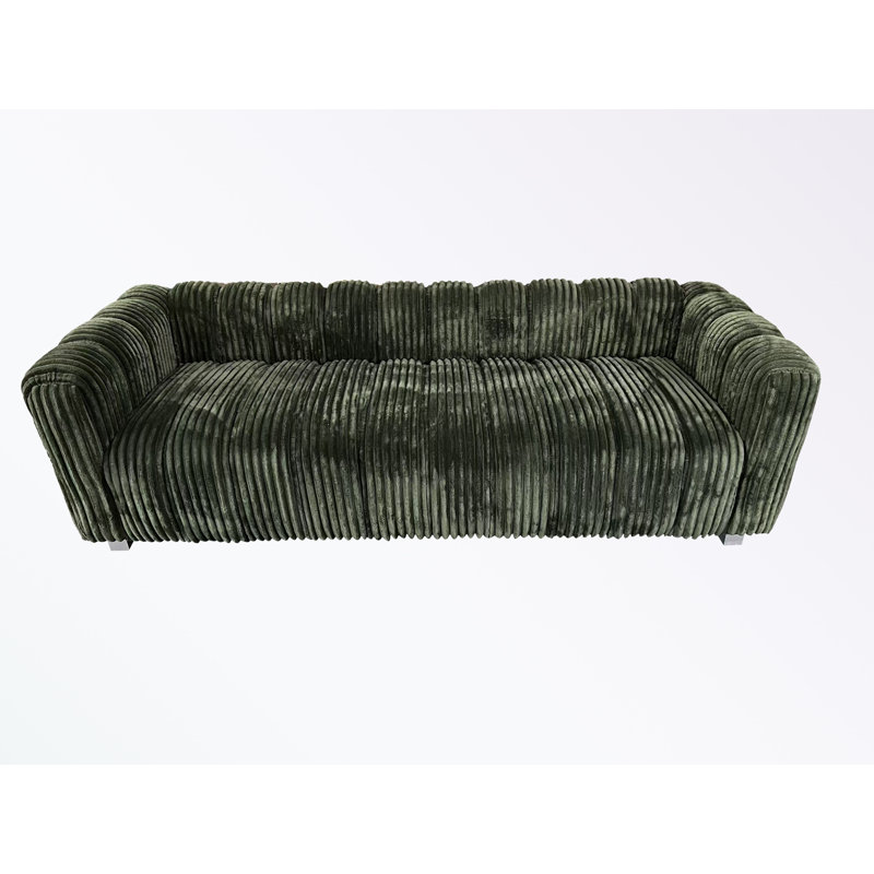 corduroy sofa with pillows and sturdy legs, Green