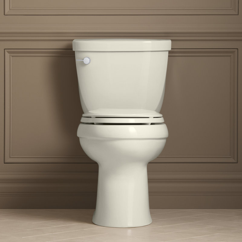 Toilette allongée deux pièces 1,28 gpf avec technologie de chasse chasse aquapiston et levier de déclenchement à gauche cimarron confort height