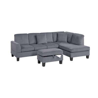 Canapé modulaire 3 pièces en velours côtelé gris foncé avec méridienne et rangement pour un espace de vie contemporain.