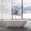 Baignoire autoportante à surface solide de 67 po, baignoire autoportante en résine de pierre avec trop-plein et bonde escamotable, blanc mat