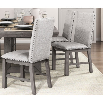 Chaises de salle à manger en tissu beige 2 pièces, structure en bois gris avec garniture cloutée, aspect rustique moderne, largeur de 24 po, profondeur de l'assise de 17 po, pièce 2 pièces, revêtement texturé, structure, meubles de 19,5 po