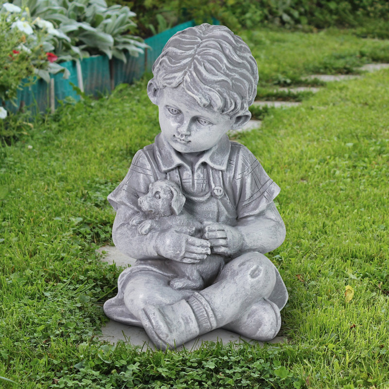 Statue garçon avec chiot