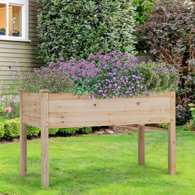 Jardinière surélevée pour l'extérieur en bois de sapin avec doublure en tissu et trous de drainage Rigney