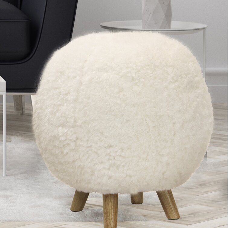 I got a comfy new desk chair and foot stool, a pouf ottoman for