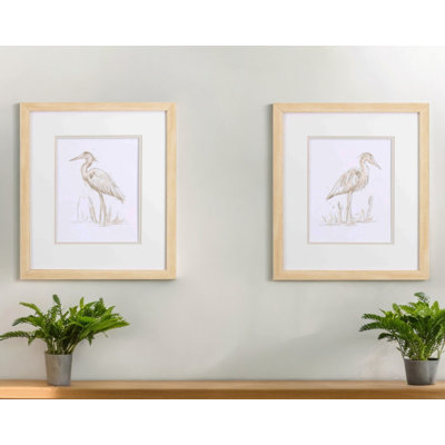Ensemble de deux reproductions d'art encadrées brun héron sépia
