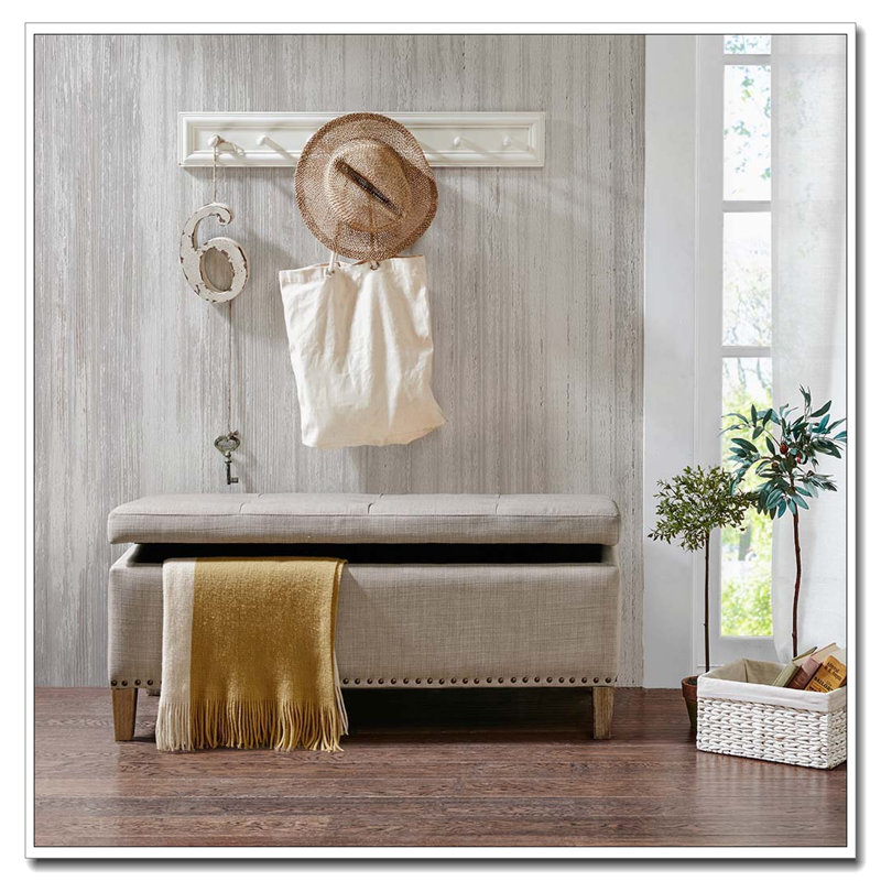 Banc de rangement capitonné avec têtes de clou en cuivre