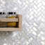Oyster .5x1 Herringbone Polished Pearl Mosaic Tile