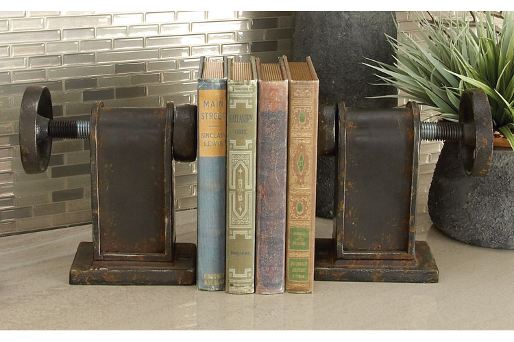 industrial-style bookends holding up vintage-looking books