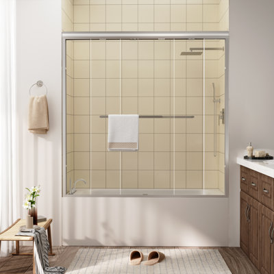 Porte de douche coulissante encadrée en noir mat avec verre transparent