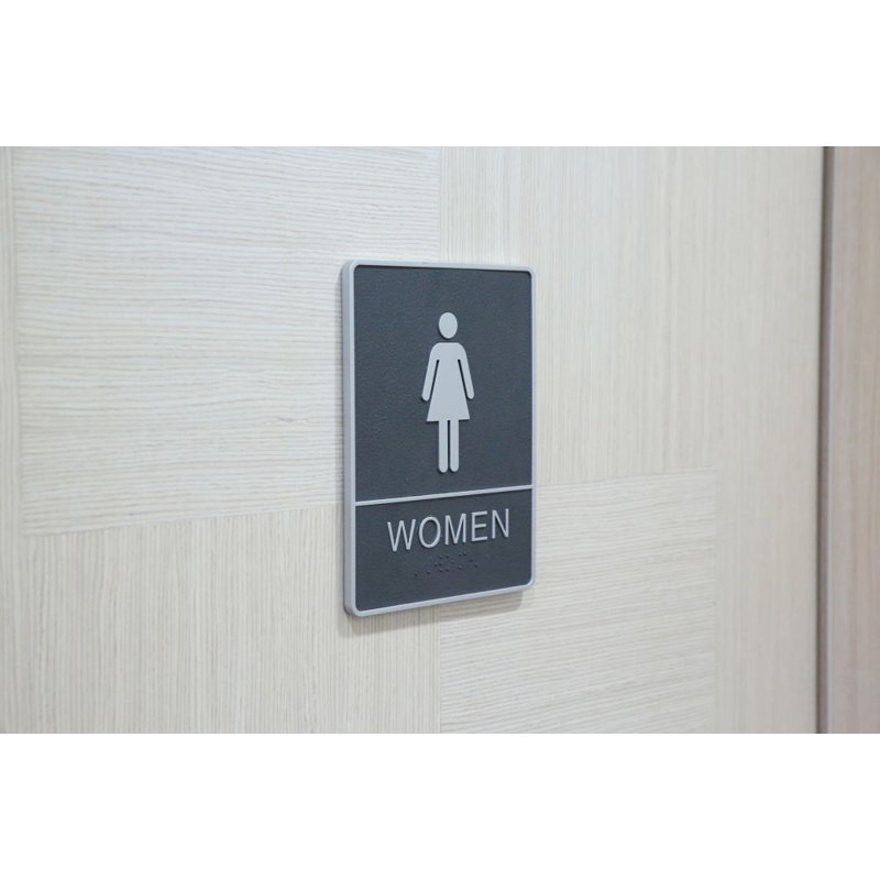 Plaque de porte de toilettes