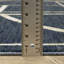 Tapis géométrique rayé bleu / ivoire Rayan-1400315155