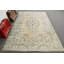 Tapis turc rétro avec un élégant motif en médaillon floral dans des couleurs pastel douces pour une décoration intérieure unique