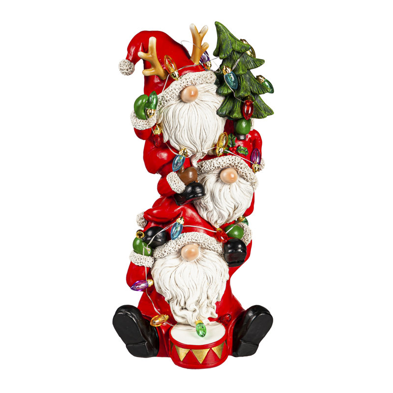 Statuaire de père Noël empilé