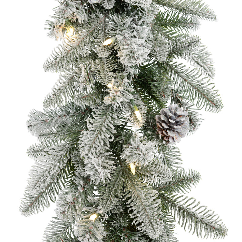 Snowy Stockbridge Pre-Lit 9 Foot. Flocked Garland with Twinkle Lights and Silver Glitter Pinecones