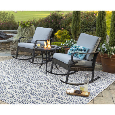 Chaise berçante en métal avec coussins Malia