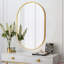 Élégant miroir ovale en métal-117805242-117805245